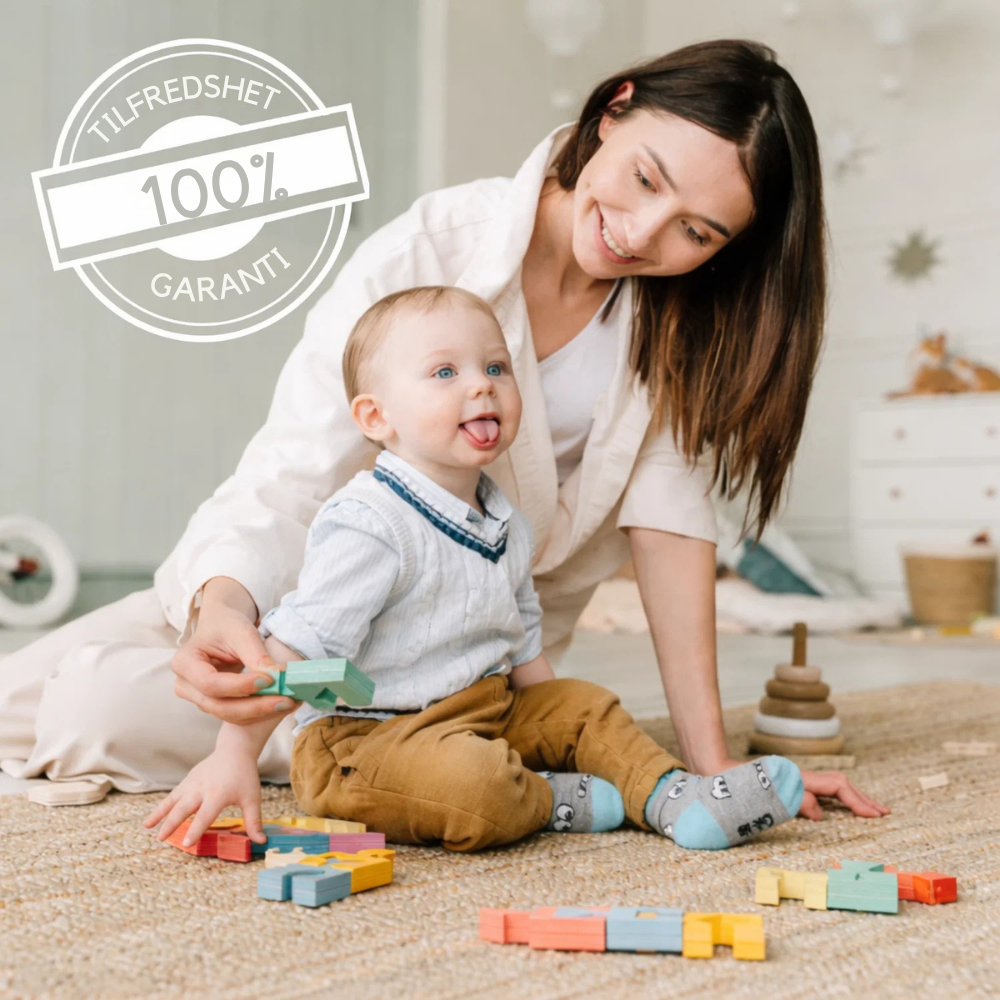 SnuggleWrap™ | Gjør hverdagen lettere med baby tett på